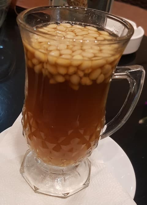 Mint tea with pine nuts
